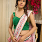 Blush pink floral fantasy chanderi saree draped with embroidered border