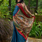 Elegant striped cotton saree in teal, enriched with hand-painted Kalamkari pallu