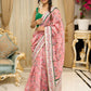 Blush pink floral fantasy chanderi saree draped with embroidered border