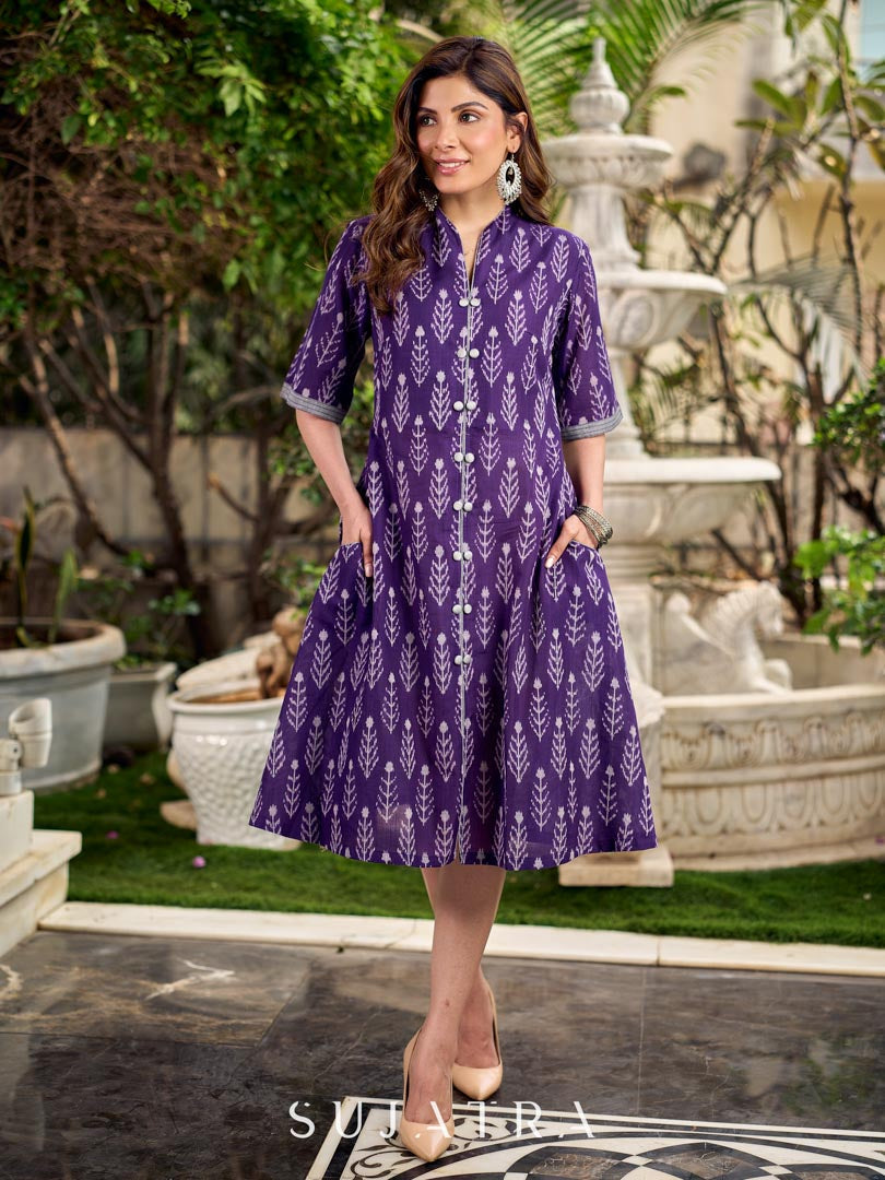 Elegant purple mercerised Ikat dress designed with a softly folded round neckline revealing grey highlights and balanced grey accents throughout