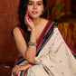 Classic ivory cotton saree adorned with Jamdani-inspired woven motifs