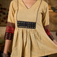 Chic Beige Cotton Top Enhanced With Ajrakh Print Sleeves And An Embellished Mirror Work Yoke