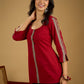 Elegant maroon cotton top highlighted with beautiful border detailing.