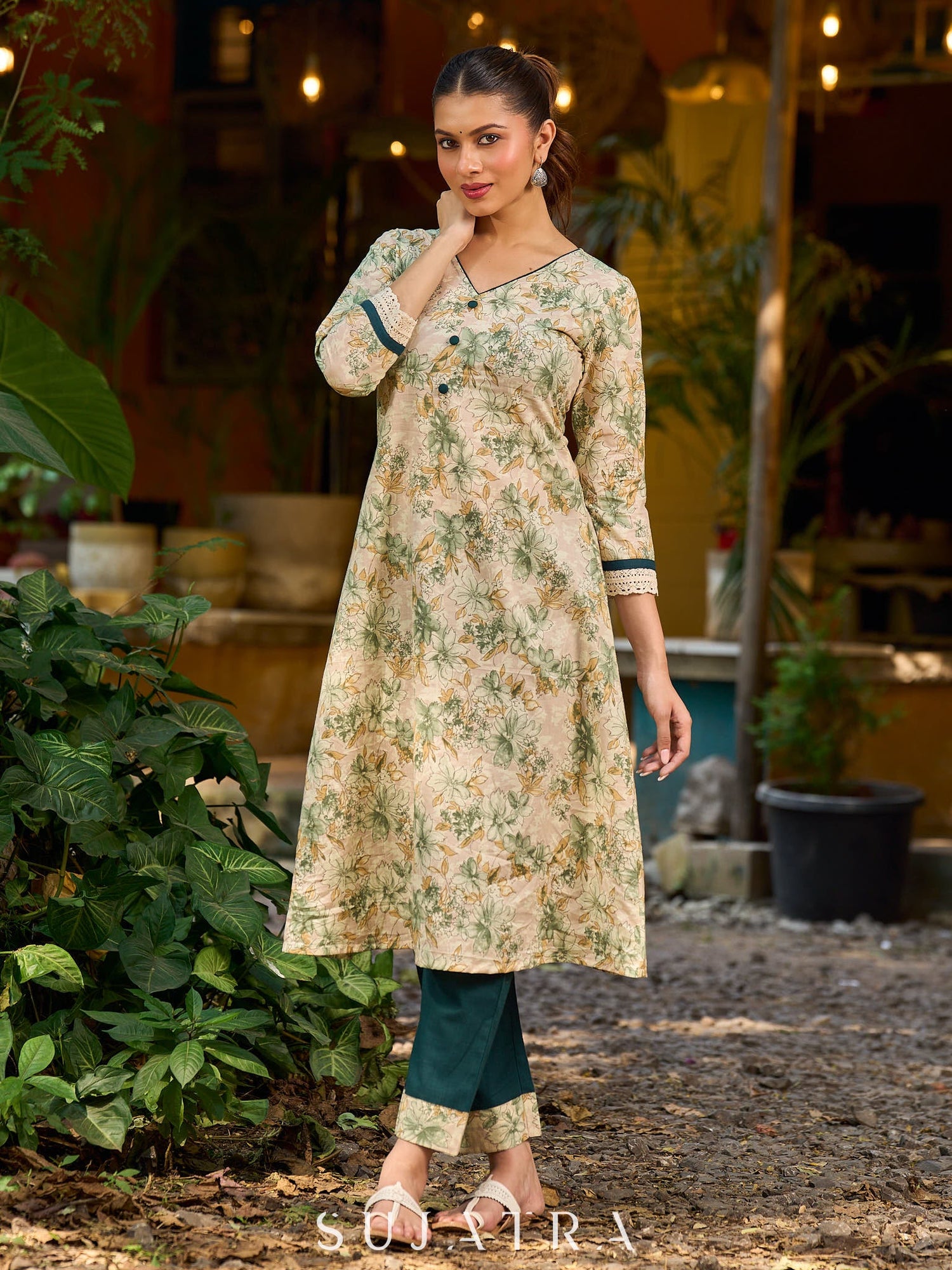 Soft cream delicate floral a line kurta with refined bottle green accents