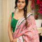 Blush pink floral fantasy chanderi saree draped with embroidered border