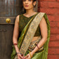Pastel green semi-silk saree featuring Madhubani artwork on pallu and border