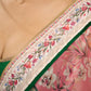 Blush pink floral fantasy chanderi saree draped with embroidered border