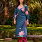 Graceful teal kurta with delicate pink lotus printing, subtle pink accents, and a statement patch above the neckline.