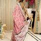 Blush pink floral fantasy chanderi saree draped with embroidered border