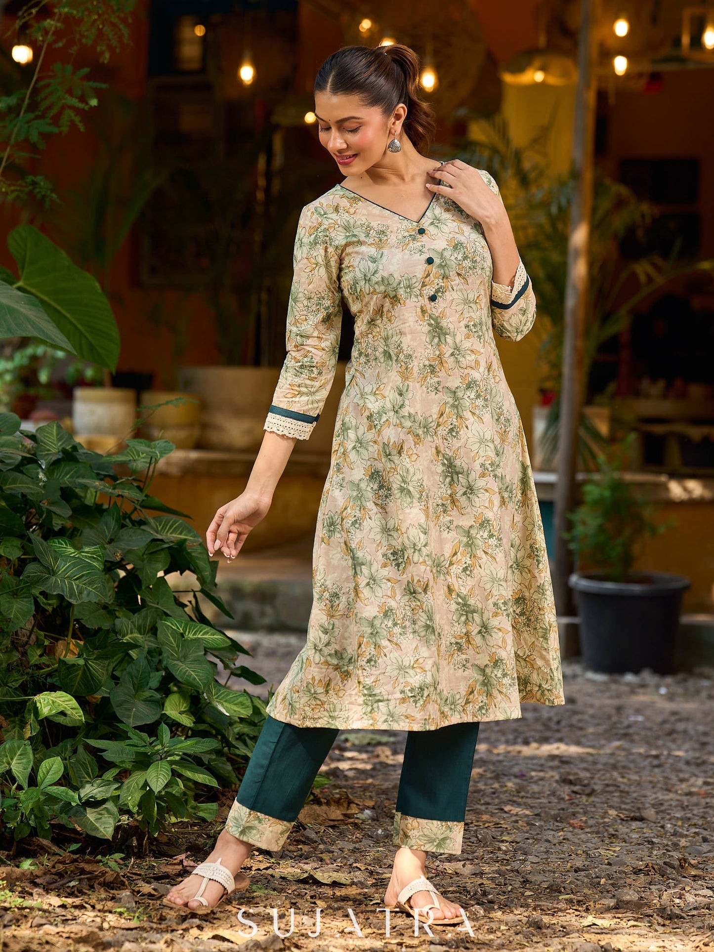 Soft cream delicate floral a line kurta with refined bottle green accents