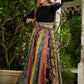 Modern colourful Ajrakh lehenga beautifully contrasted by a sleek black gathered topwear.