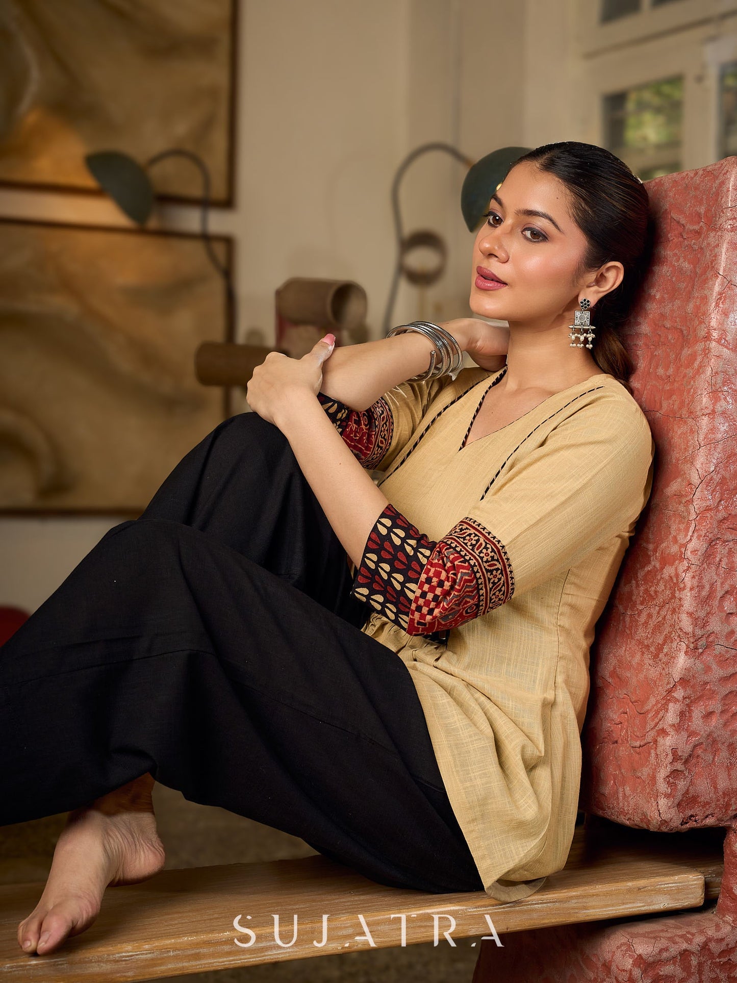 Chic Beige Cotton Top Enhanced With Ajrakh Print Sleeves And An Embellished Mirror Work Yoke