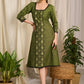 Rich green cotton dress with elegant block print and sequin embellishments