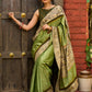 Pastel green semi-silk saree featuring Madhubani artwork on pallu and border