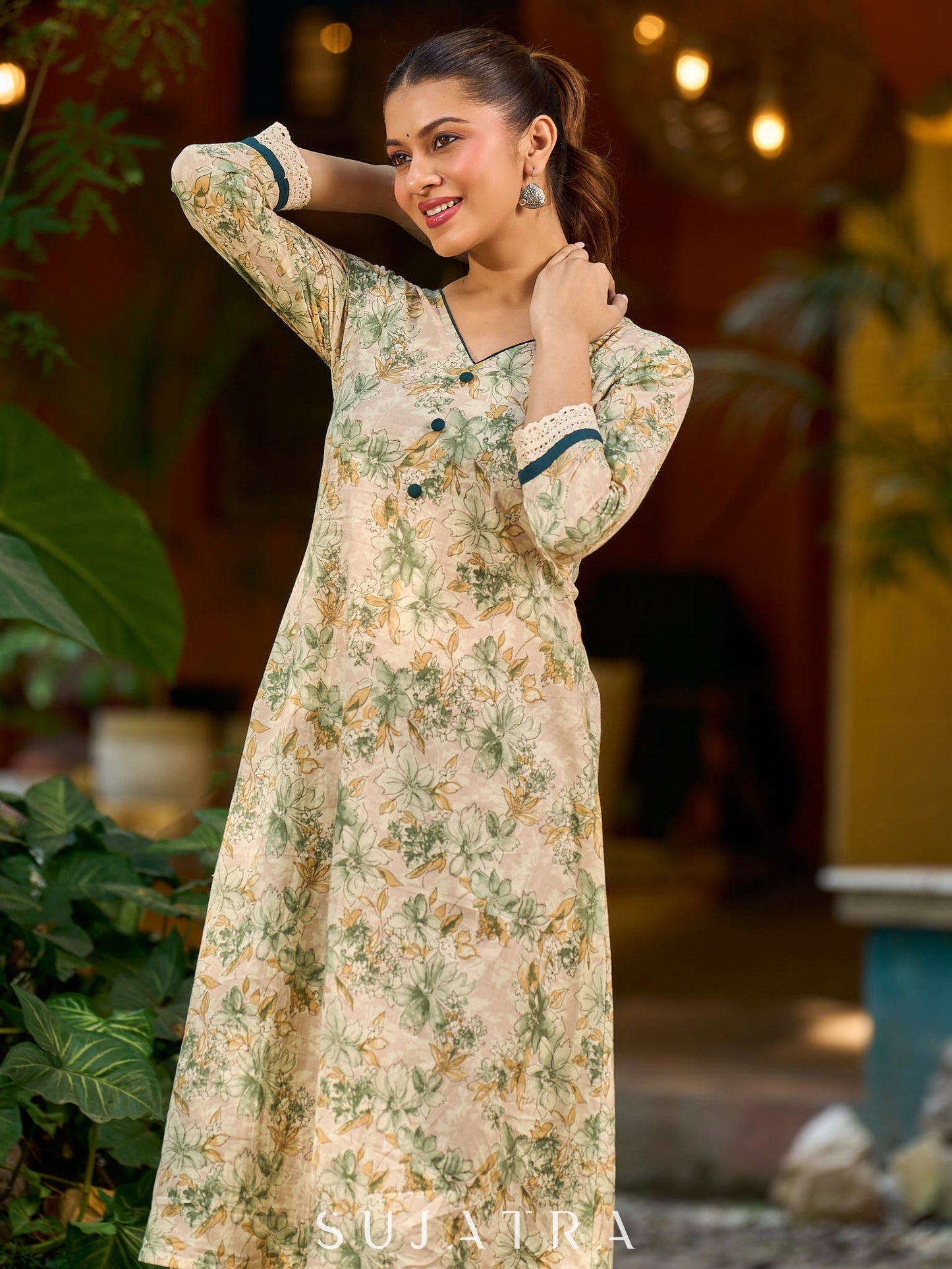 Soft cream delicate floral a line kurta with refined bottle green accents