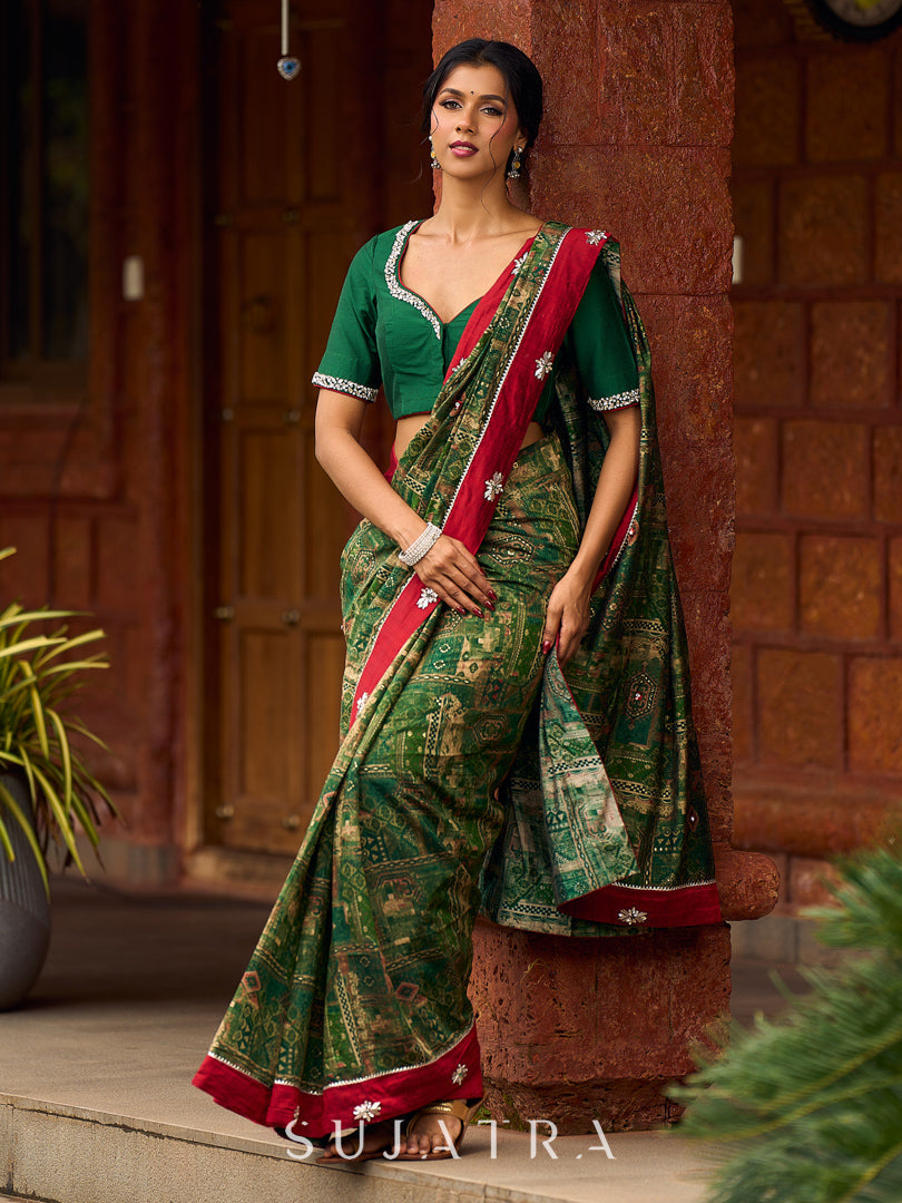 Sophisticated Dark Green Viscose Printed Saree with Diamond-Studded Border & Pallu