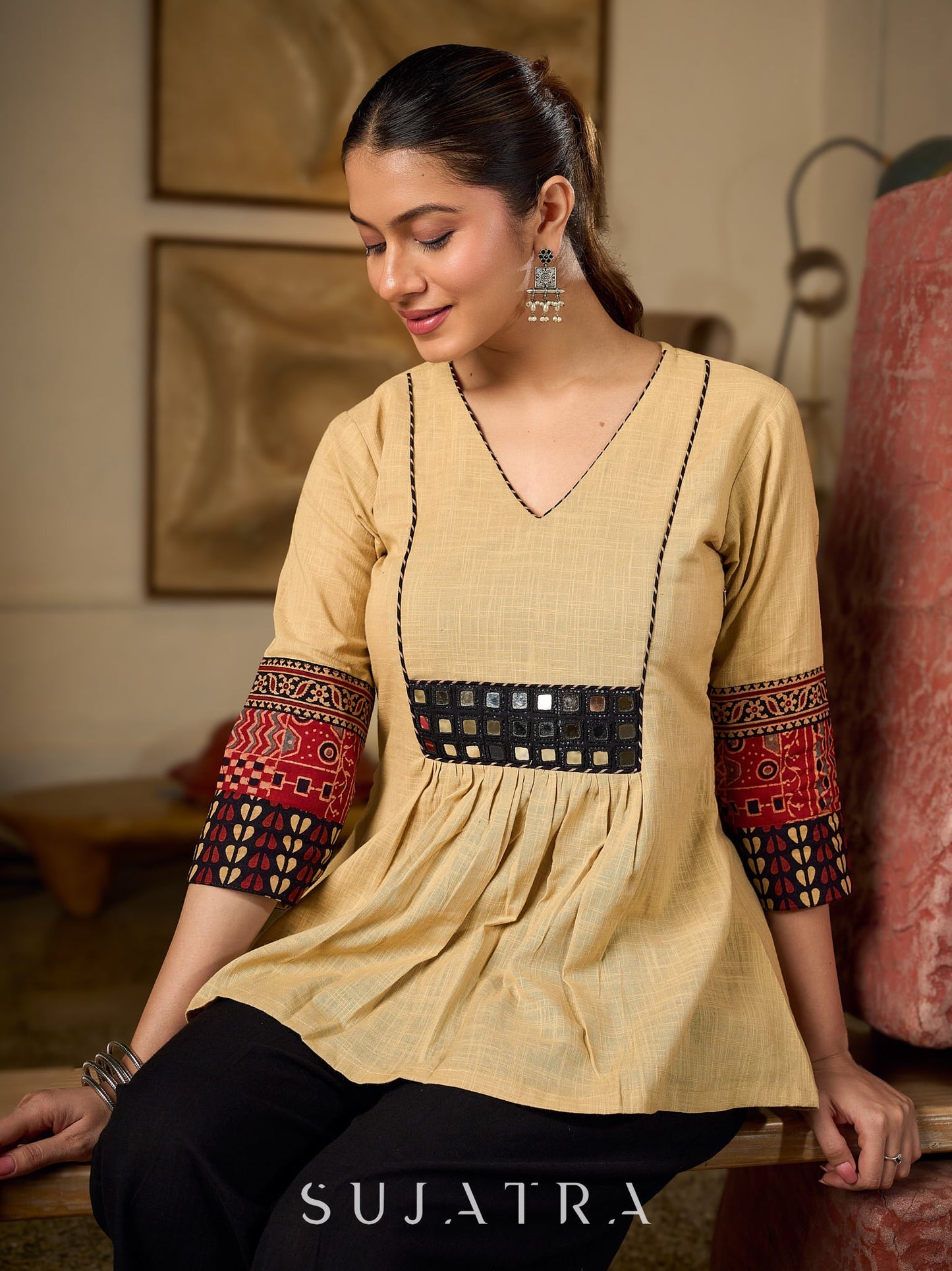 Chic Beige Cotton Top Enhanced With Ajrakh Print Sleeves And An Embellished Mirror Work Yoke