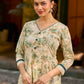 Soft cream delicate floral a line kurta with refined bottle green accents