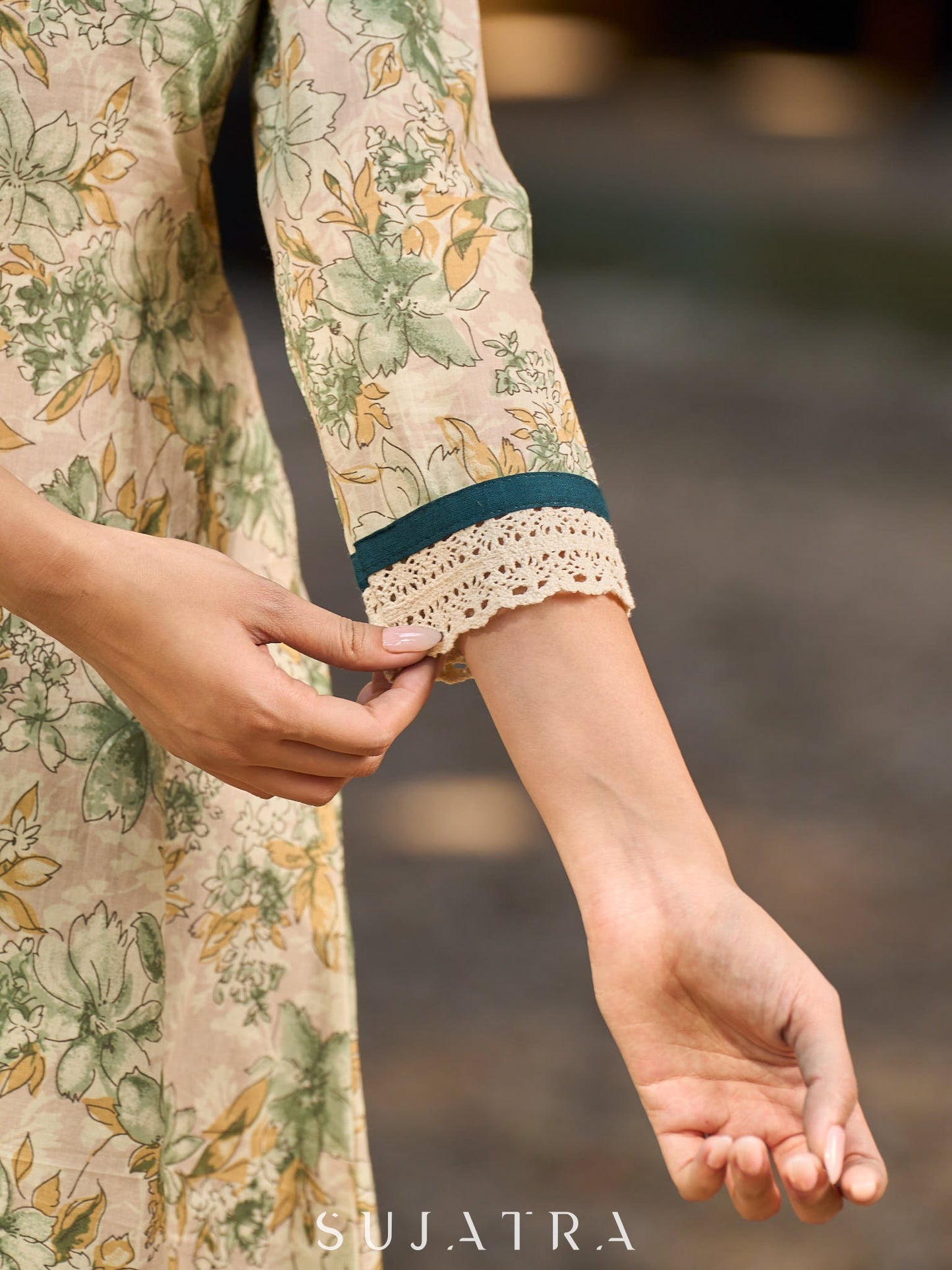 Soft cream delicate floral a line kurta with refined bottle green accents