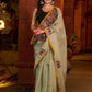 Classic olive Chanderi saree enhanced with heritage batik appliqué