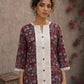 Deep red Jaipur floral printed top featuring maroon pintuck yoke, off-white panel, and scalloped lace detailing.