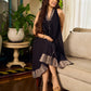 Modern black bias-cut dress showcasing unique artisan-inspired Kalamkari neck trim.