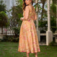 Effortless sunshine yellow floral dress designed with a delicate neckline, gathered straps, and a breezy, flowy form.