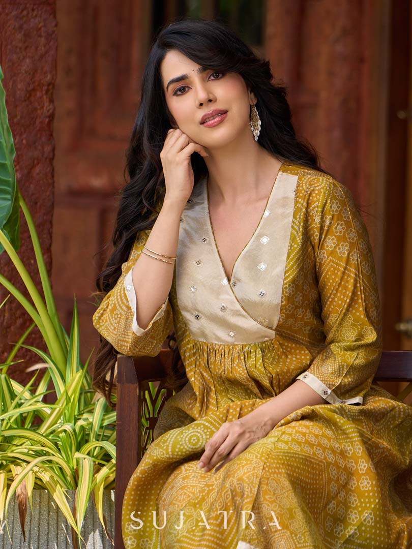 Exquisite yellow Bandhani printed kurta with a delicate off-white tissue overlay and refined accents.