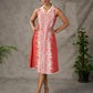 Brick Orange shirt dress with timeless traditional prints, off white notch collar and off white accents