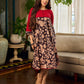 Black and Maroon Elegant Kalamkari Dress with pintuck detailing and flowing bias-cut silhouette.