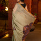 Classic olive Chanderi saree enhanced with heritage batik appliqué