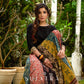 Modern colourful Ajrakh lehenga beautifully contrasted by a sleek black gathered topwear.
