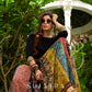 Modern colourful Ajrakh lehenga beautifully contrasted by a sleek black gathered topwear.