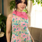 Summer pink floral sleeveless dress featuring an asymmetrical cowl collar and delicate pearl accents, creating a soft, fluid silhouette with a touch of elegant, contemporary charm.