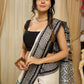 Pure silk saree with bold black block prints and timeless grace