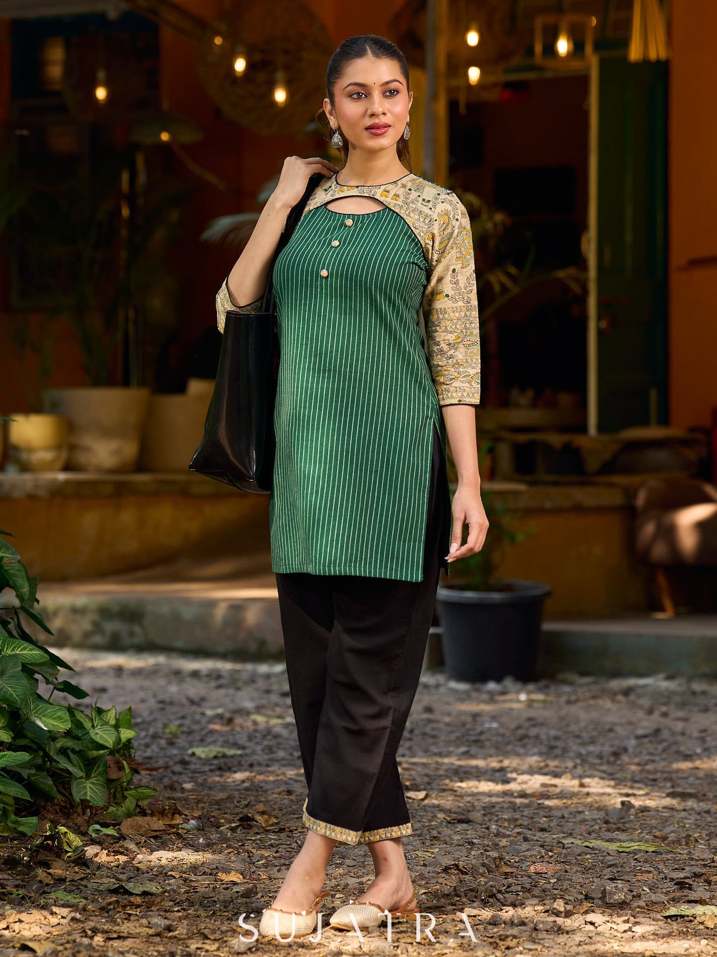 Vibrant green Ikat Madhubani short kurta featuring a stylish cut neckline