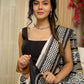 Pure silk saree with bold black block prints and timeless grace