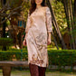 Artisanal cream kurta adorned with Gond-inspired motifs and classic brown accents