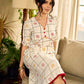 Soft off-white block printed rayon dress with intricate all-over hand block printed checks and florals, a gently gathered yoke, and rich red accents for a refined, elegant everyday look.