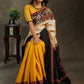 Elegant Cotton mustard and creme saree with black Cotton Ikat Pallu and Kalamkari Border