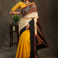 Elegant Cotton mustard and creme saree with black Cotton Ikat Pallu and Kalamkari Border
