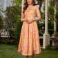 Effortless sunshine yellow floral dress designed with a delicate neckline, gathered straps, and a breezy, flowy form.