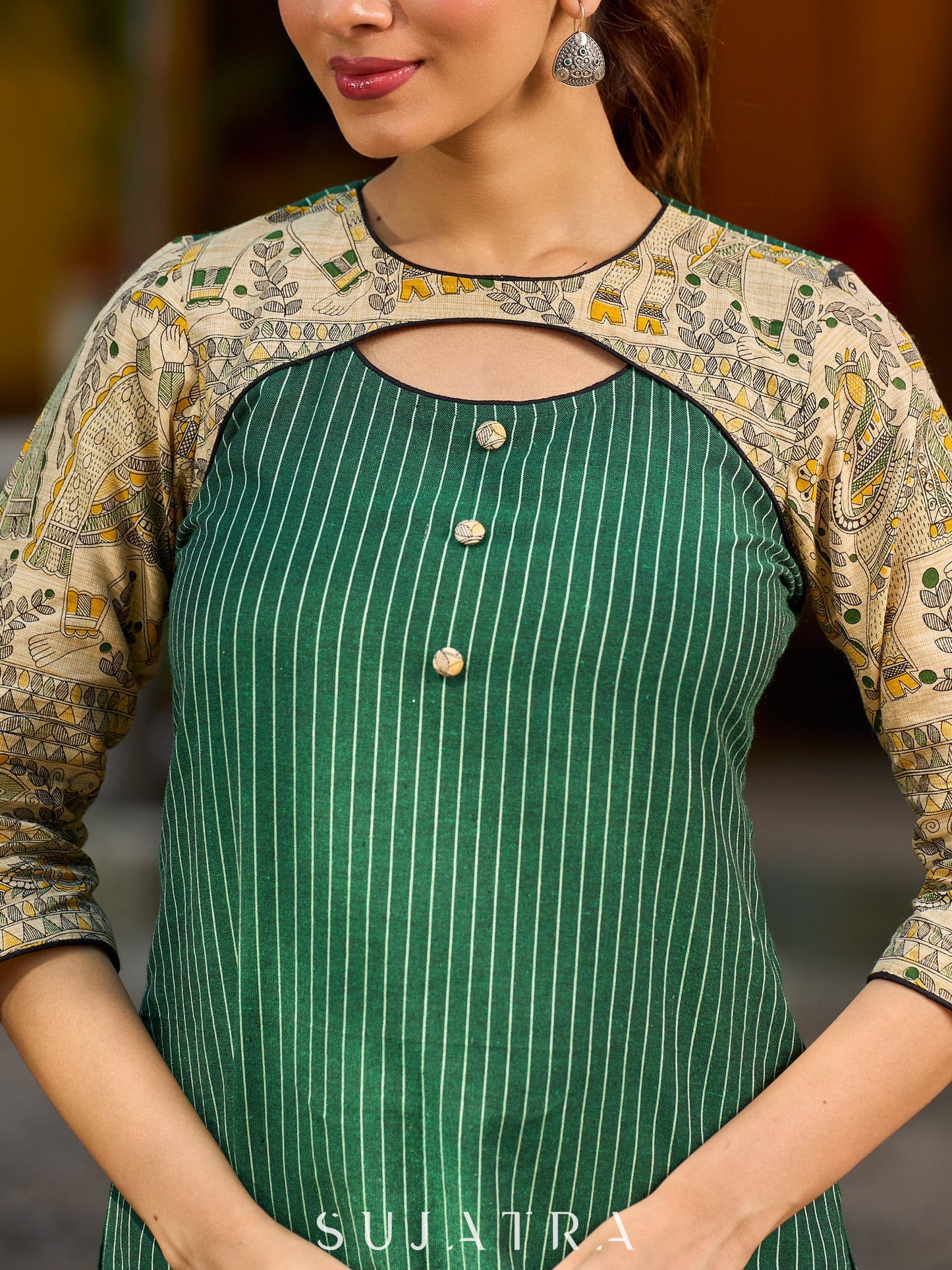 Vibrant green Ikat Madhubani short kurta featuring a stylish cut neckline