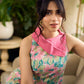 Summer pink floral sleeveless dress featuring an asymmetrical cowl collar and delicate pearl accents, creating a soft, fluid silhouette with a touch of elegant, contemporary charm.