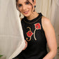 Stunning black rayon dress adorned with vibrant floral block print accents