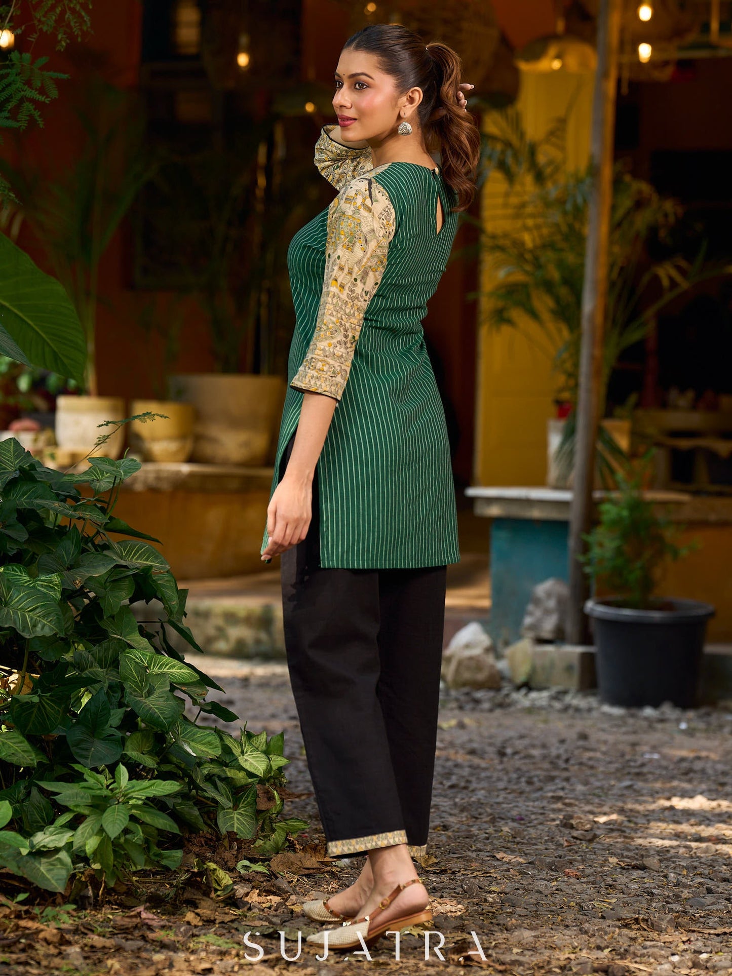 Vibrant green Ikat Madhubani short kurta featuring a stylish cut neckline