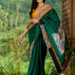 Artisanal cotton saree in bold green with Madhubani hand painted charm