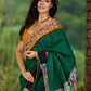 Artisanal cotton saree in bold green with Madhubani hand painted charm