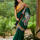 Artisanal cotton saree in bold green with Madhubani hand painted charm