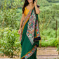 Artisanal cotton saree in bold green with Madhubani hand painted charm